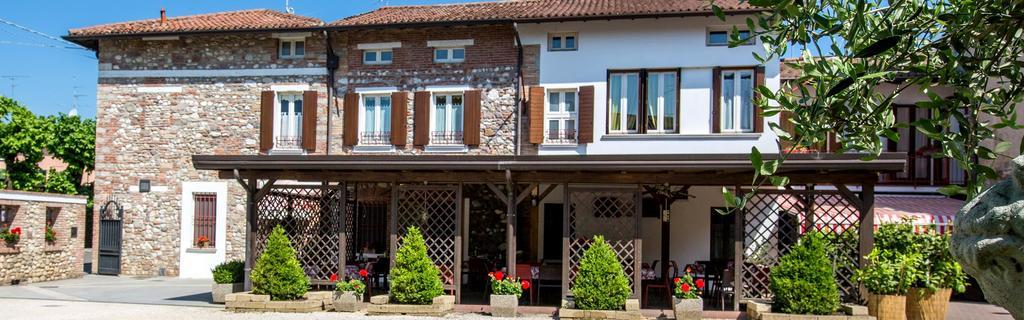 Отель Trattoria Milani Лонато Экстерьер фото